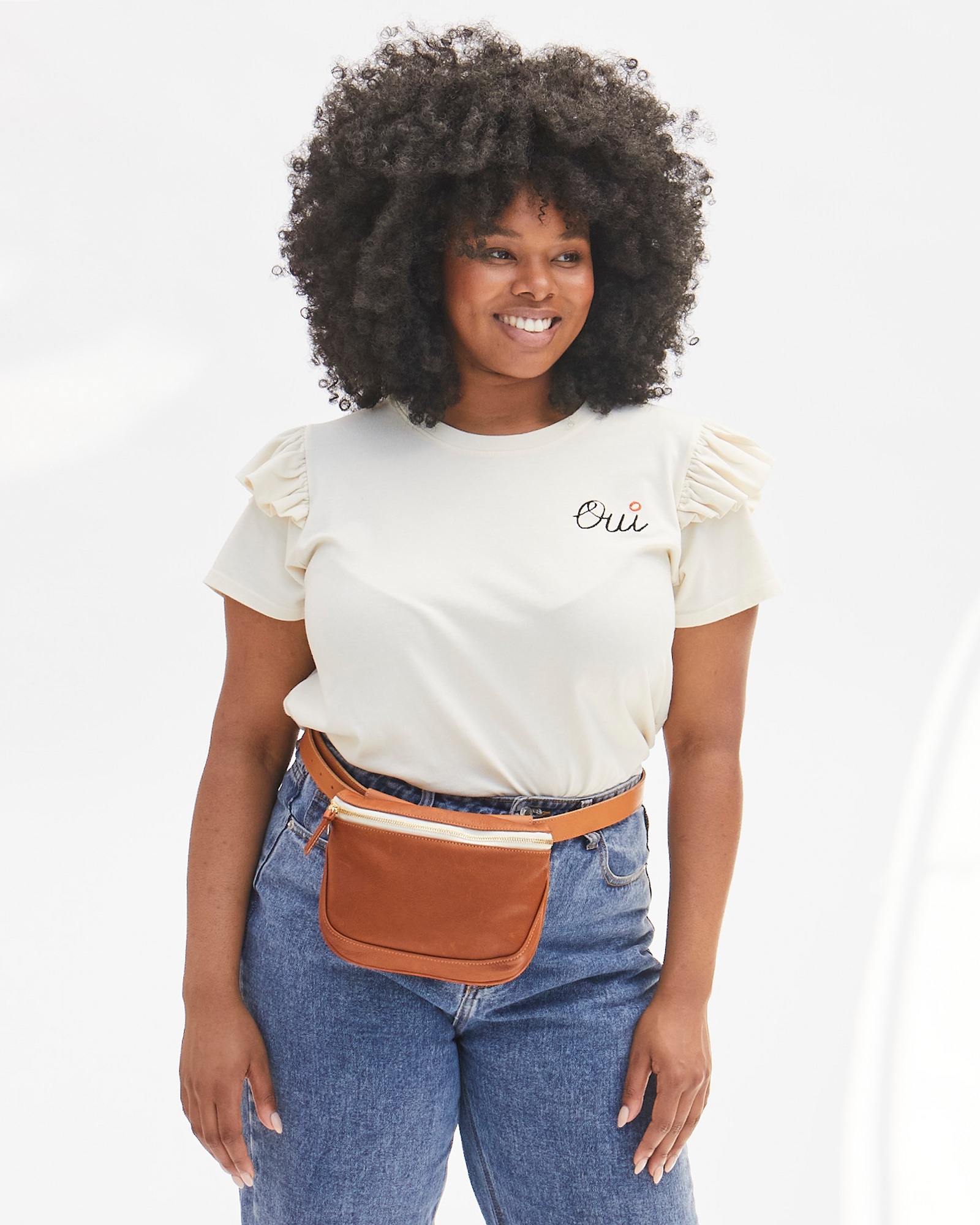Cuoio Long Fanny Pack Belt on the Tan Neptune Fanny Pack on Candace