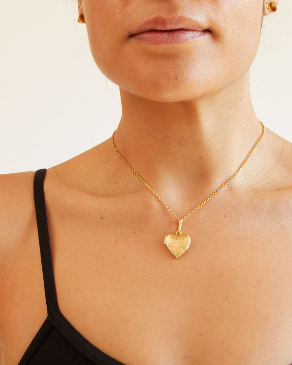 Andrea wearing the Heart Locket with Liberte, Egalite, Maternite Engraving on the vermeil rolo chain necklace