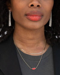 Mecca wearing the Lips Necklacr