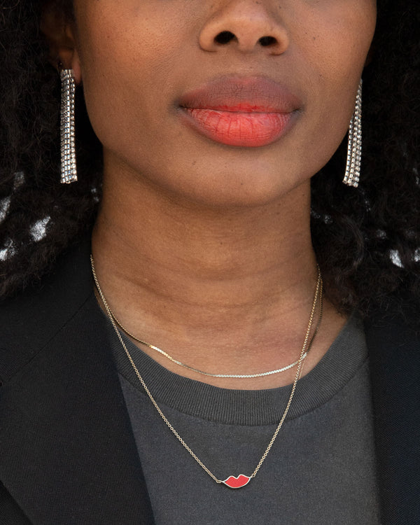Mecca wearing the Lips Necklacr
