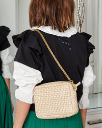 Frannie Holding the Cream Woven Checker Midi Sac with the Thick Chain Shoulder Strap