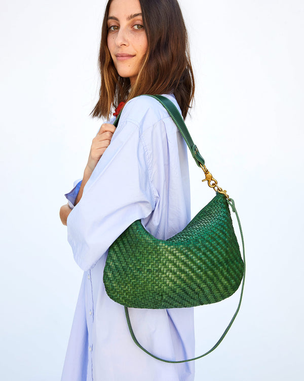 Frannie Holding the Evergreen Woven Zig-Zag Moyen Messenger on her Shoulder