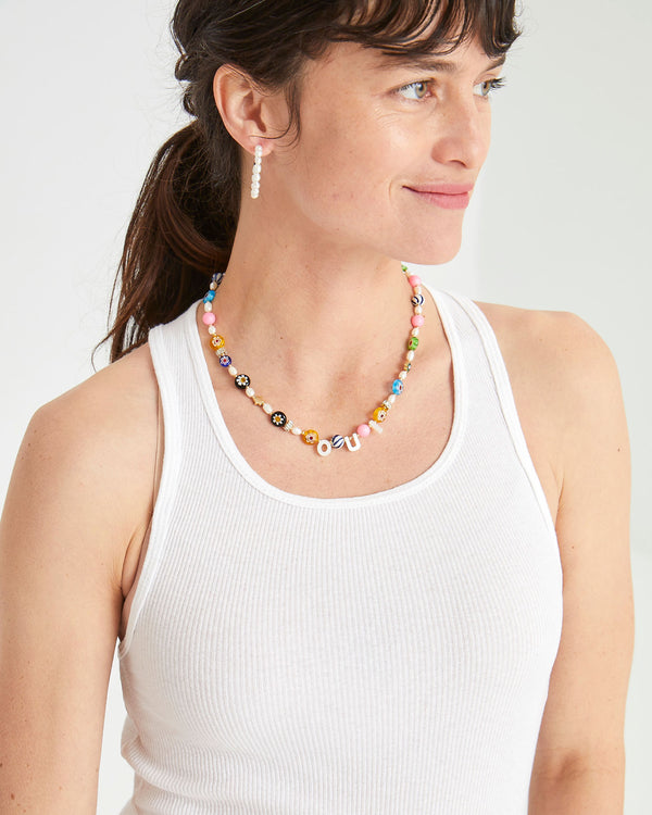 danica wearing the Oui Multi Flower Strand Necklace with a white tank top and the freshwater pearl hoops