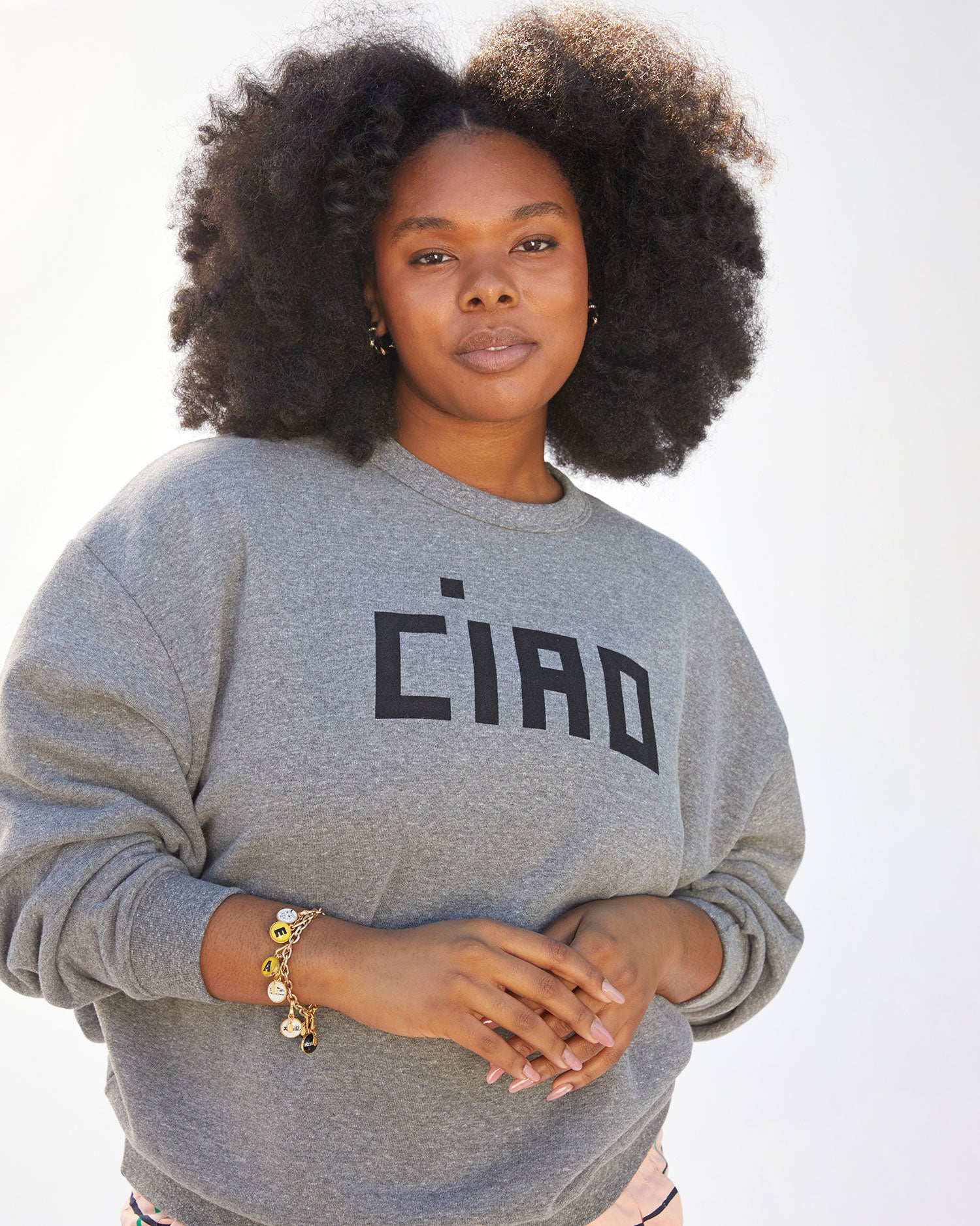 Candace wearing the Grey Ciao Oversized Sweatshirt