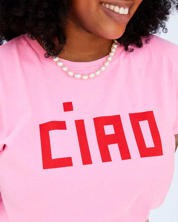 Close Up of the Ciao Decal on the Neon Pink Ciao Classic Tee on Candace
