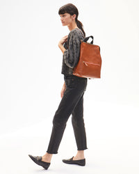 Danica in Black Jeans, Loafers and the Faded Black Jaguar Drop Shoulder Tee with the Miel Remi Backpack