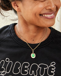Joanna Wearing the Rolo Charm Necklace with the Jade Horseshoe Charm