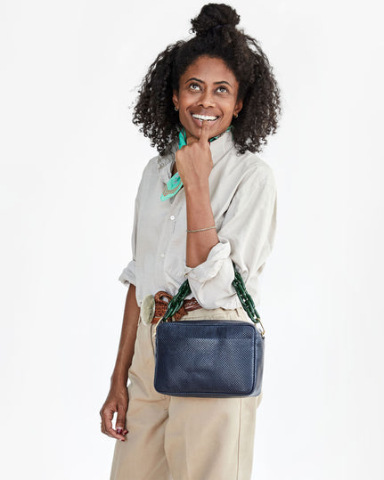 Clare V.'s single pouch nubuck Sac Bretelle combines the simplicity of a  clutch with the ease of a crossbody bag. The removable c…