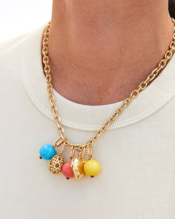 Yellow Stone Bead Charm Shown on the Charm Chain Necklace with the Turquoise Stone Bead Charm, Pink Stone Bead Charm, Rattan Egg Charm, and the  CV x EMC Heart Locket Charm