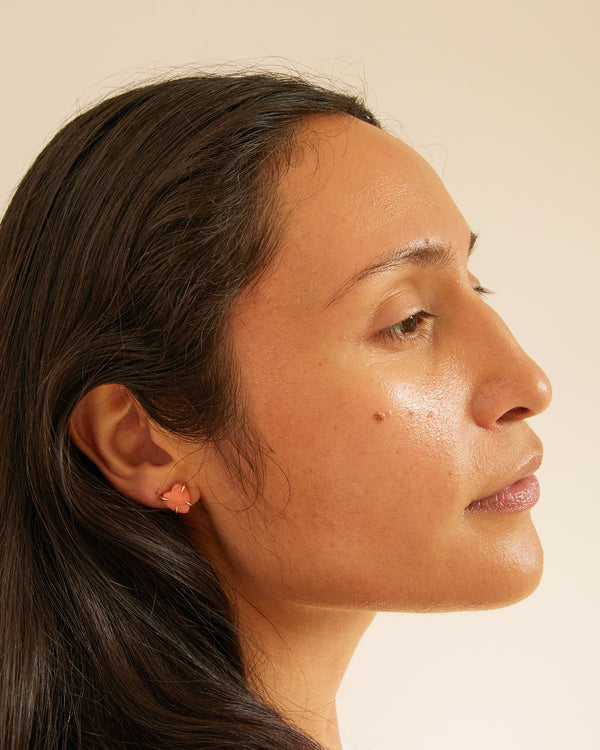 Andrea wearing the Stone Heart Stud Earrings