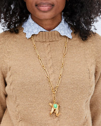 Mecca Wearing the Jade Stone Horseshoe Charm  on the Convertible Charm Necklace with the M Ribbon Letter Charm