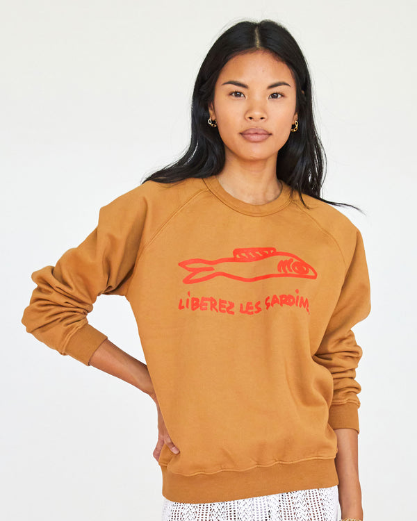 Sandra wearing the Camel Liberez les Sardines Sweatshirt 