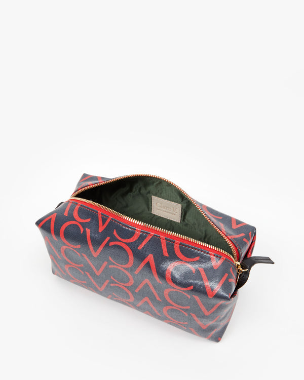 interior flat of the Navy and red repeat CV Toiletry Case 