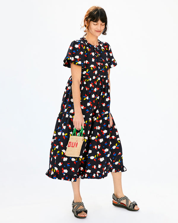 Danica in the Martine Dress Holding the Natural Oui Totita